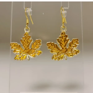 Örhängen höst. Gul.  - Handgjorda örhängen med hösttema. 