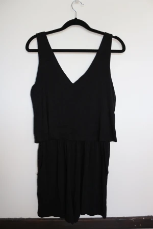 Black playsuit ( Good condition )  - Black playsuit from Cubus in a GOOD condition  Size: xs  *The item is big in size 