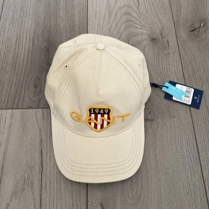 Gant keps - Aldrig använt prislapp finns kvar 