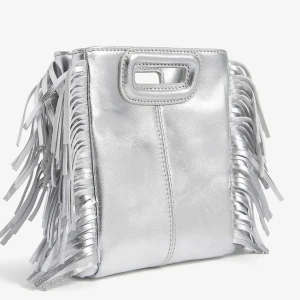 Maje Väska Liten - Säljer min Maje väska som är silvrig på ena sidan och har paljetter på andra. Super snygg väska som är så himla fin på våren och sommaren. Dustbag finns!💕