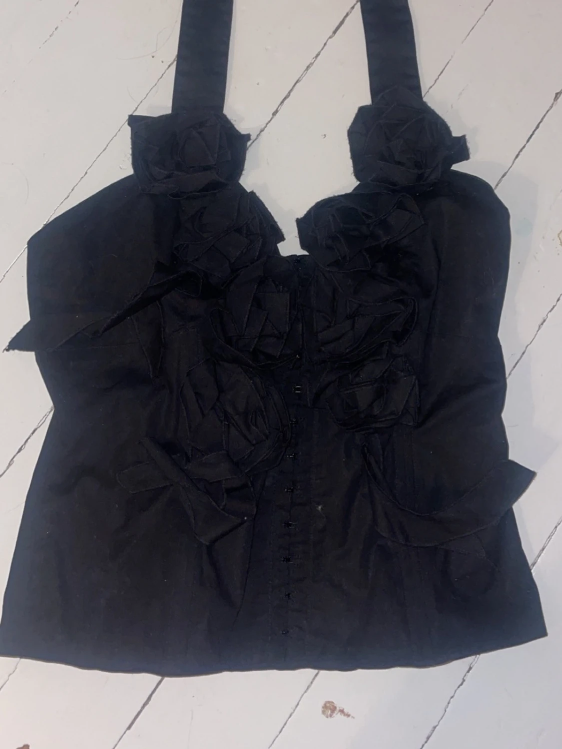 Svart korsettopp med rosetter från Lissa - 1