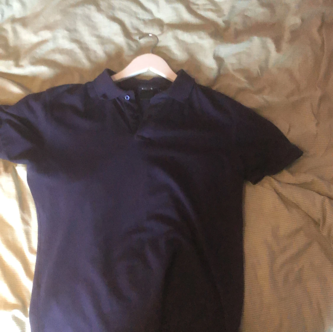 Mörkblå pikétröja i bomull