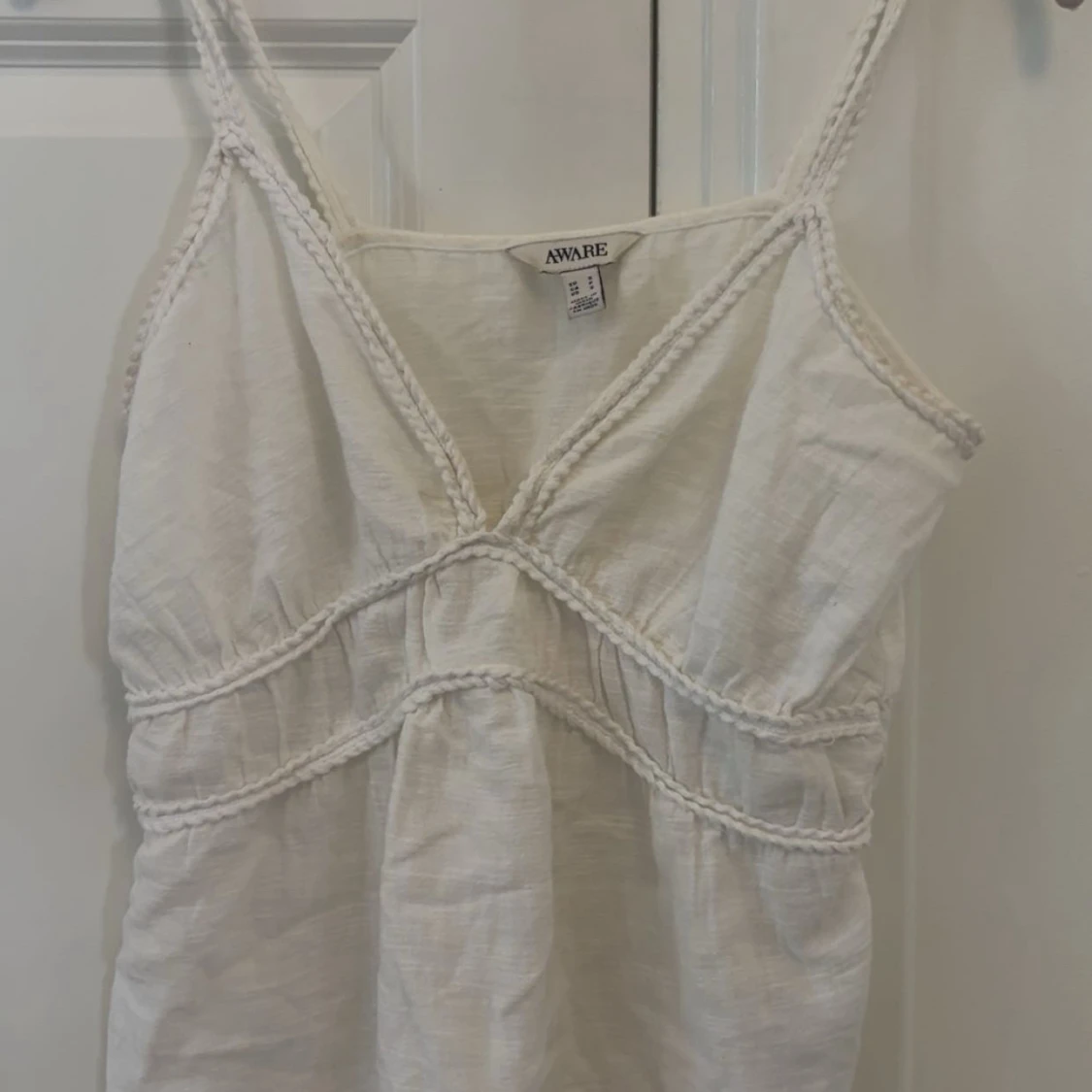 Vit linnetopp från AWARE, stl S