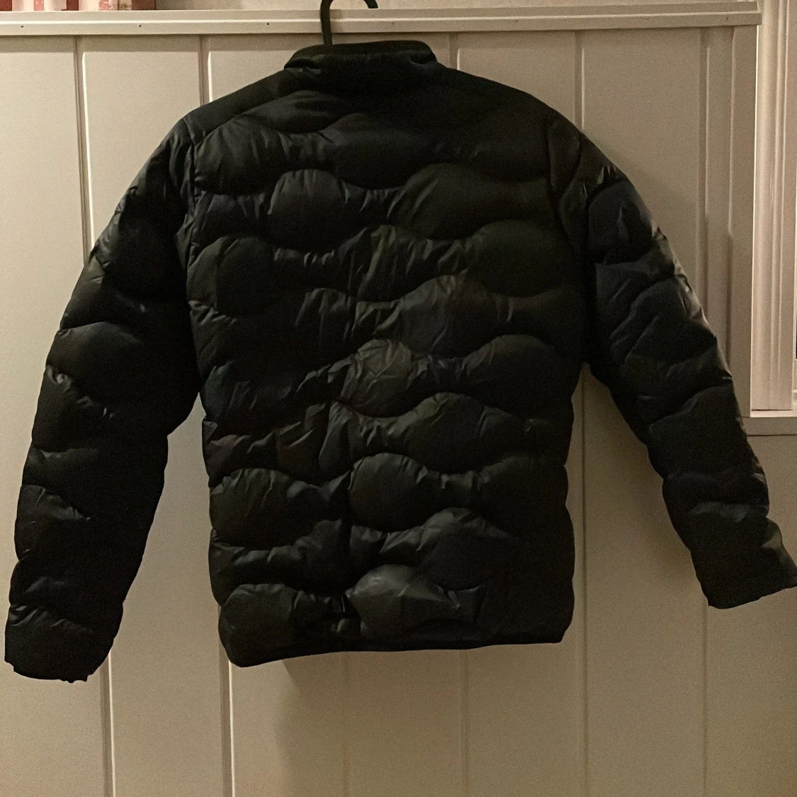 Svart dunjacka Peak Performance  - 90