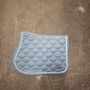 Lamicell Schabrak - Nytvättat Lamicell schabrak i storlek ponny