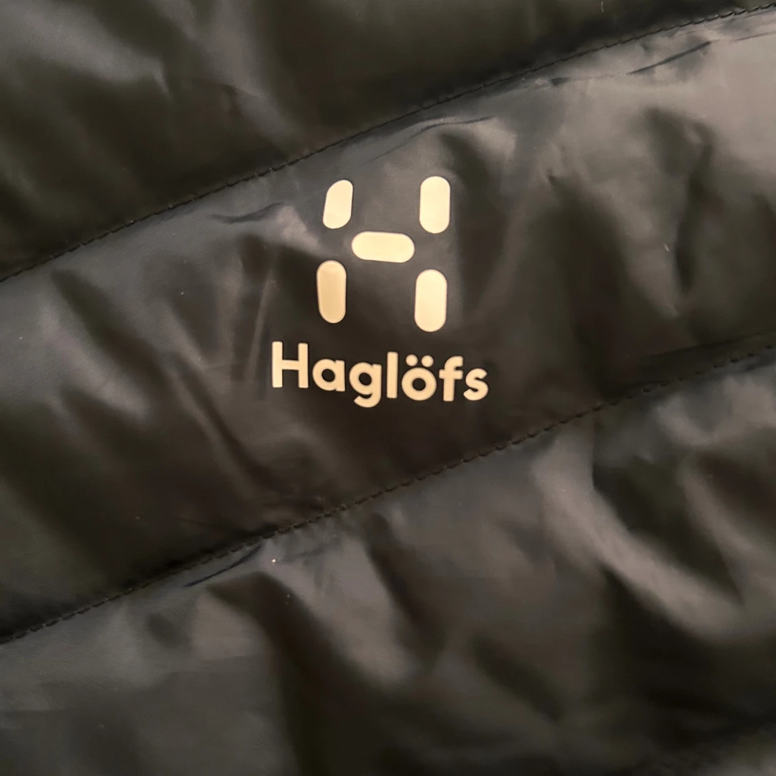 Svart pufferjacka från Haglöfs M - 1