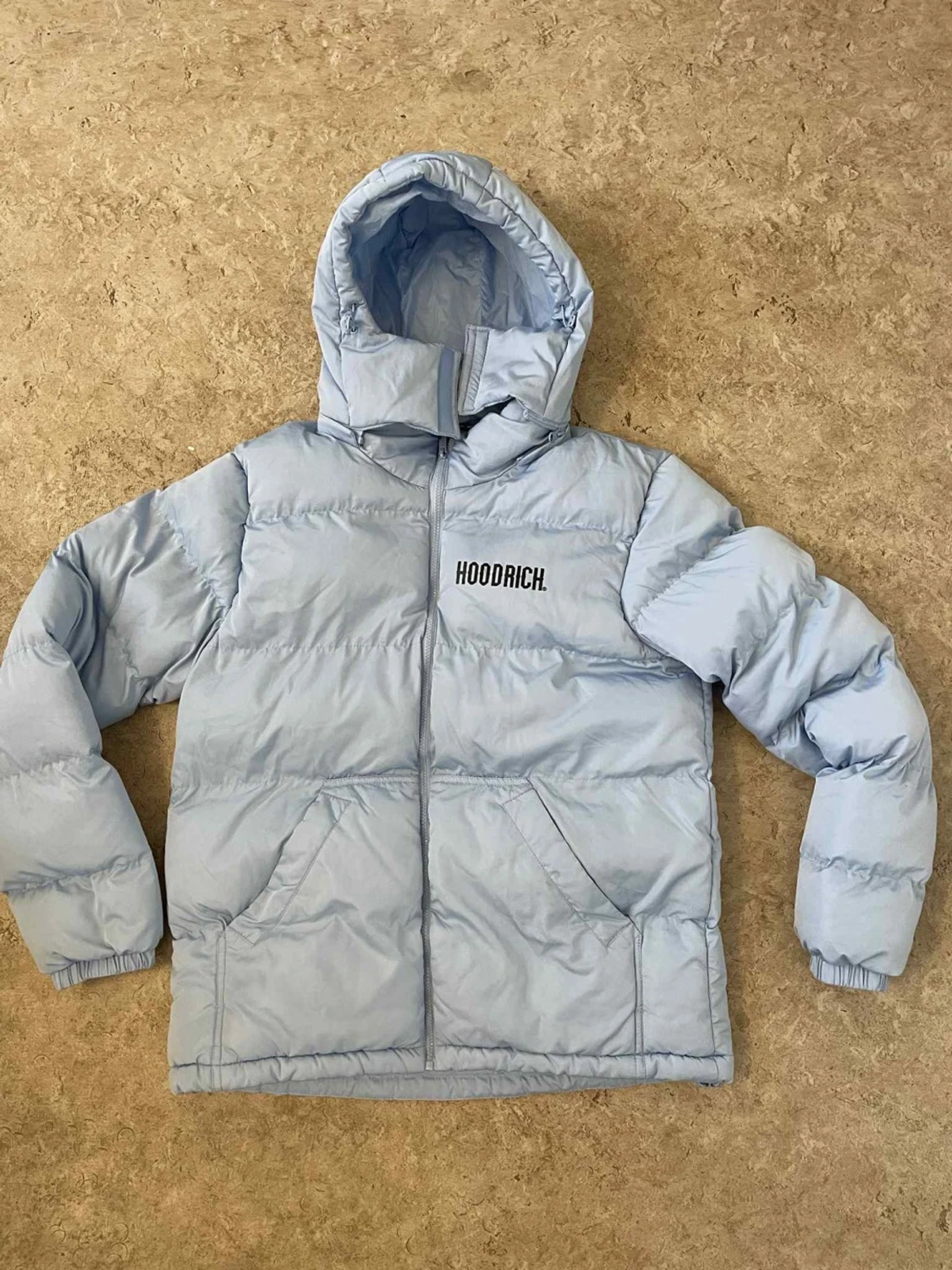 Ljusblå pufferjacka från Hoodrich