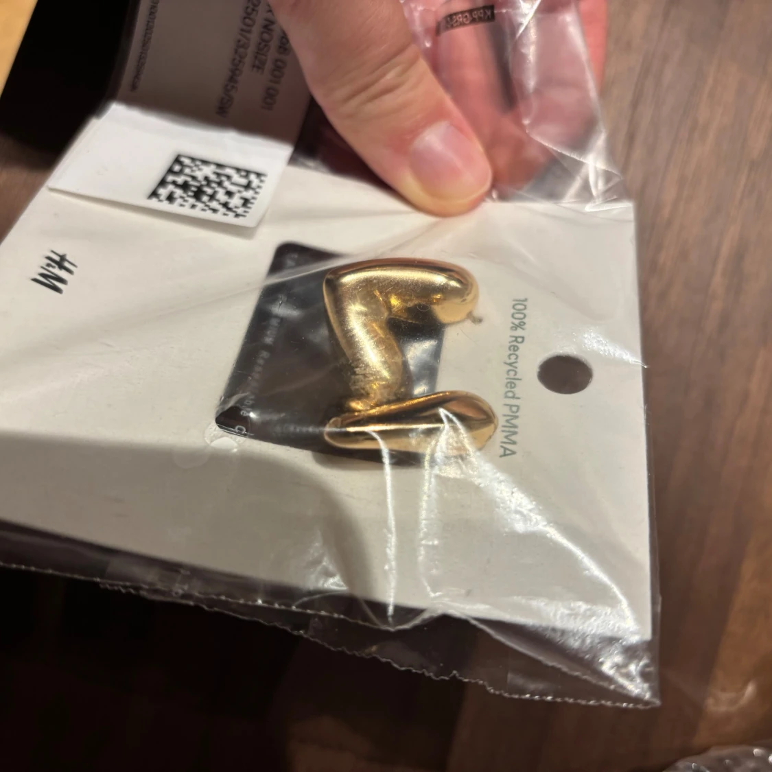 Guldiga hjärtformade örhängen H&M - 2