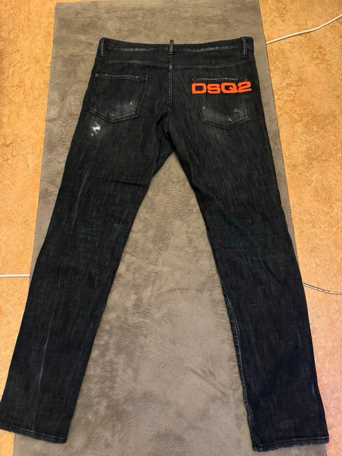 Svarta DSQ2 jeans med slitningar - 1