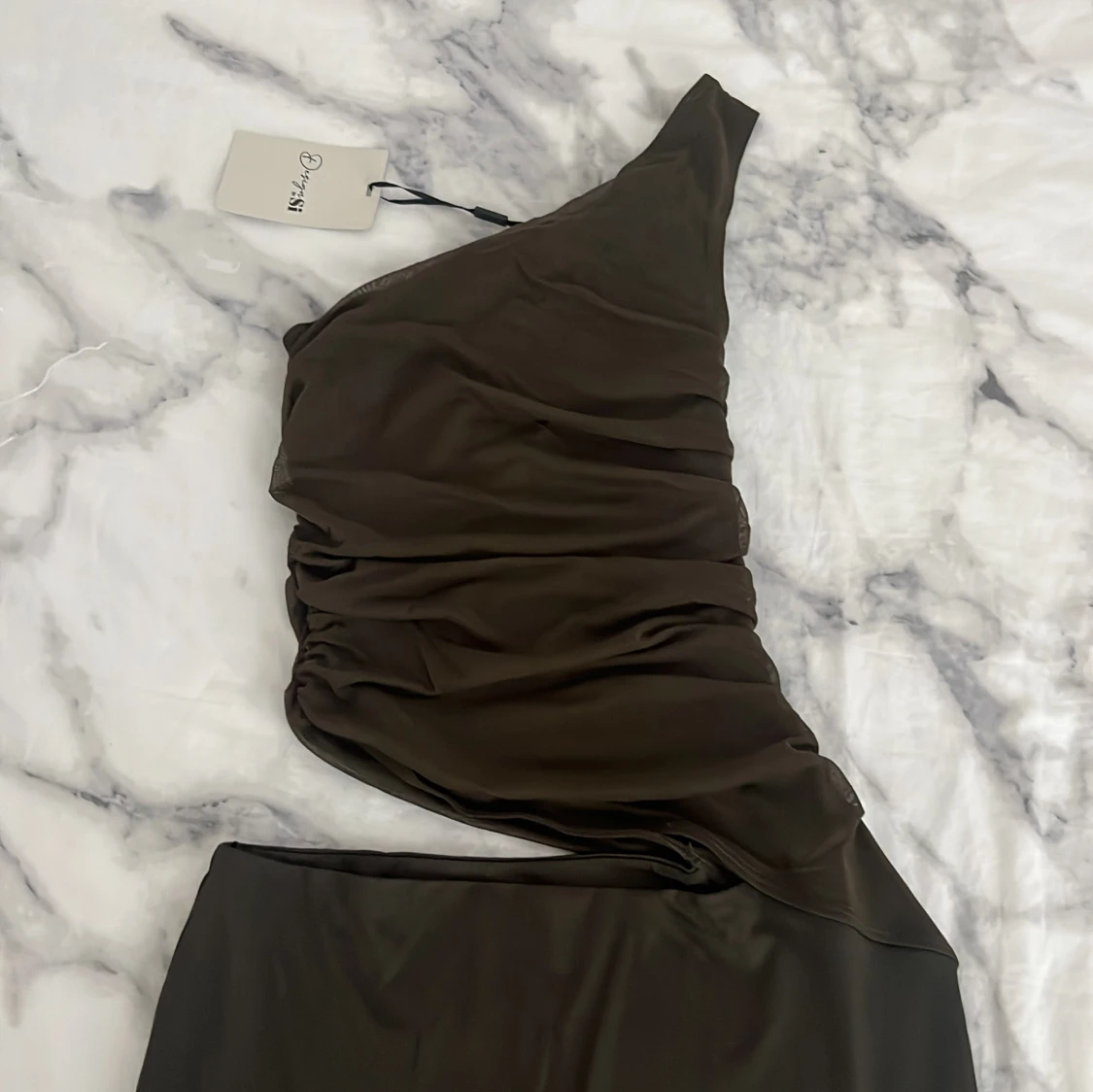 Mörkgrön tajt klänning 