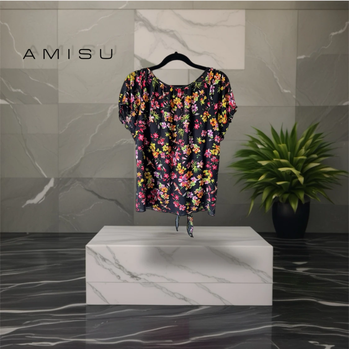 Blommig svart blus med knyt