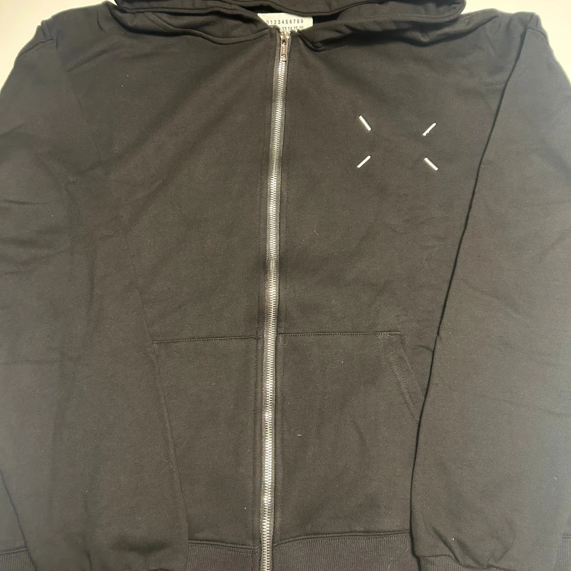 Svart hoodie från Maison Margiela