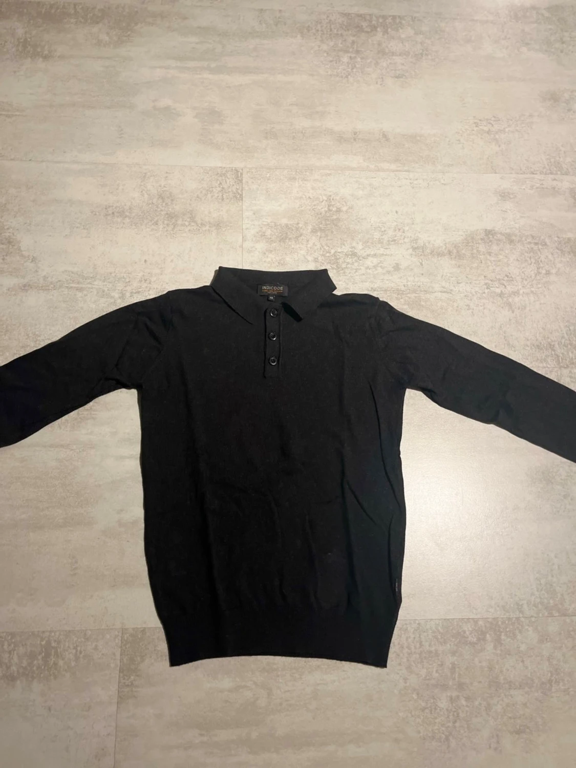 Svart stickad pikétröja från Indicode XS