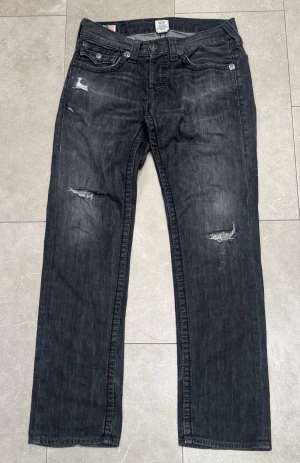 Svarta jeans från True Religion - True religion svarta jeans. Använd ett fåtal gånger. Storlek: W30 L30