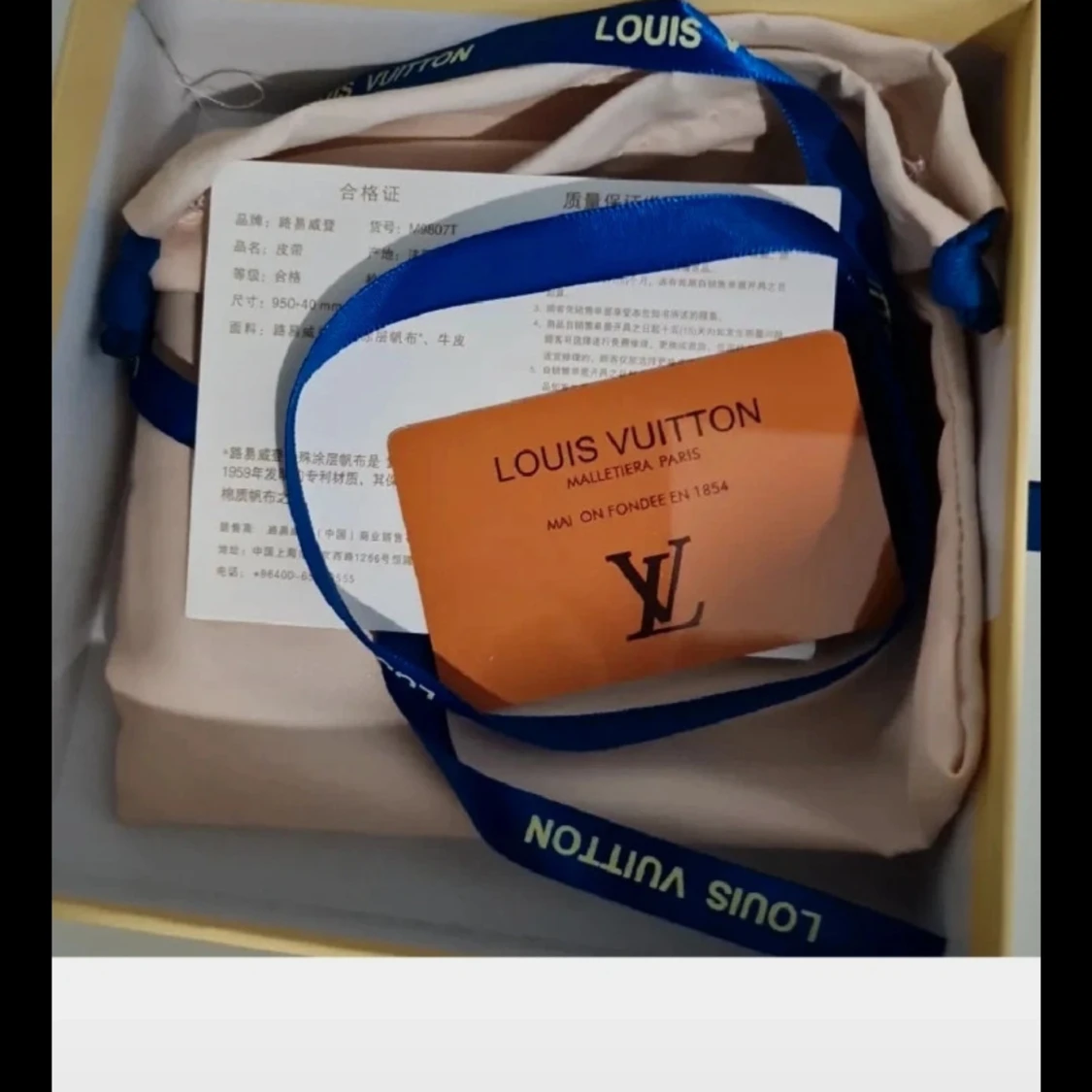 Rutig L&V bälte i skinn - 2