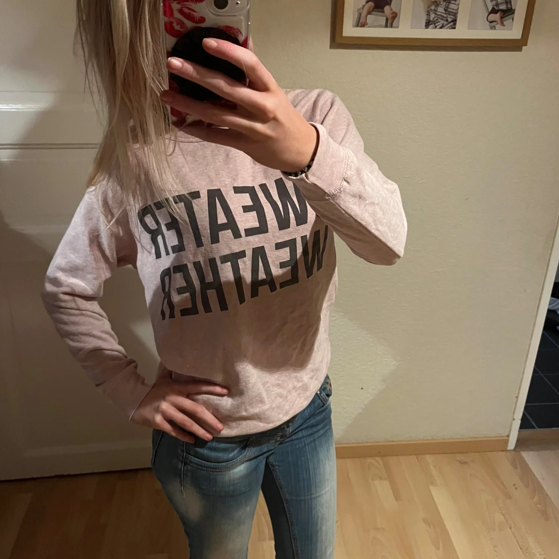 Ljusrosa sweatshirt med tryck