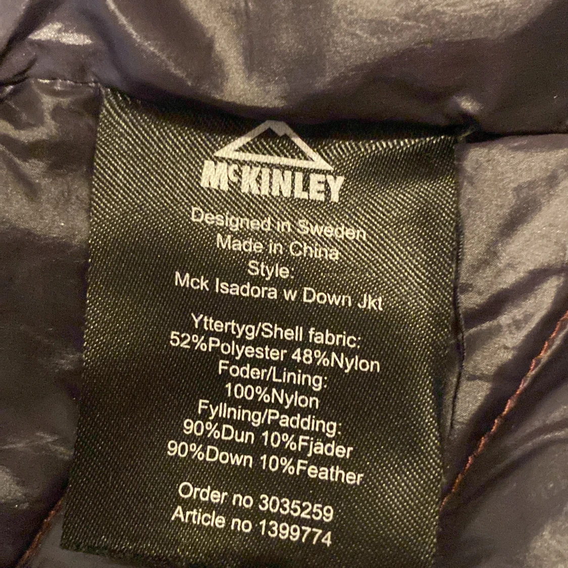 Mörkröd dunjacka från McKinley - 2