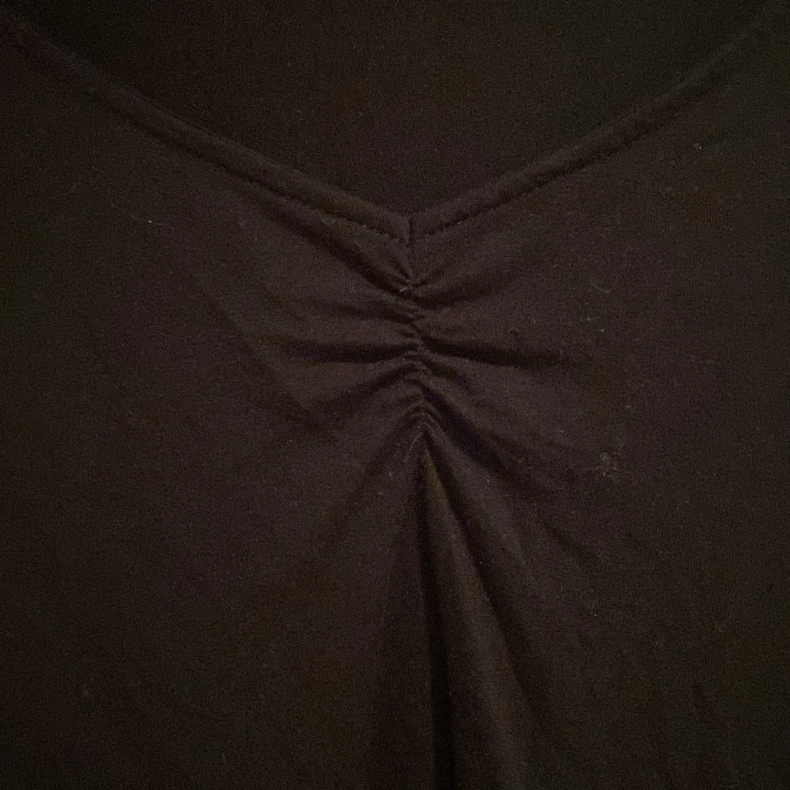 Svart topp med v-ringning H&M S - 1