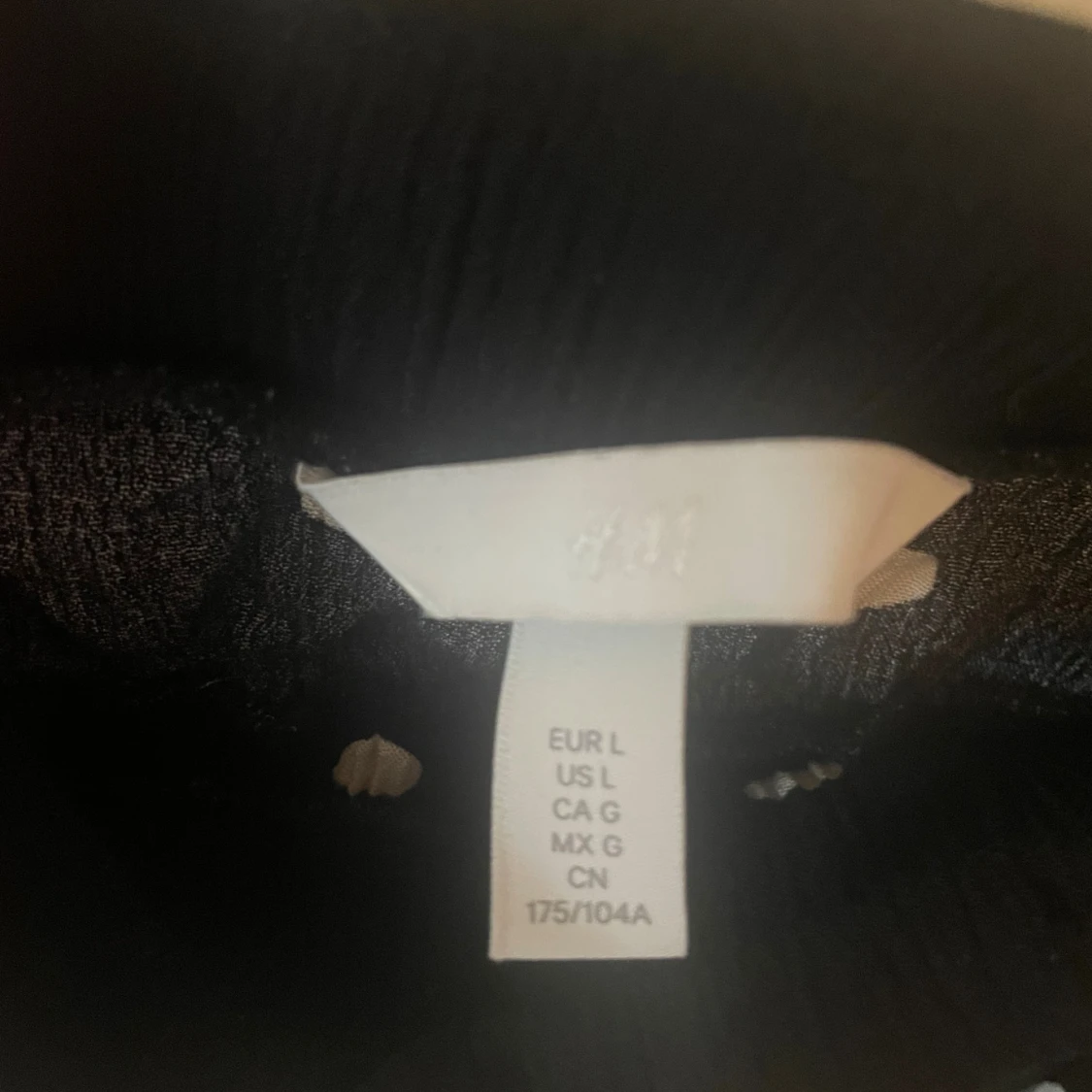 Svart prickig croppad topp H&M - 2