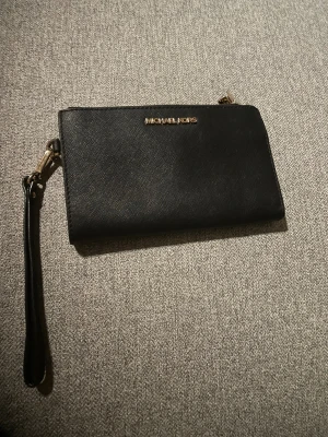 Svart plånbok från Michael Kors - Snygg plånbok i ny skick!