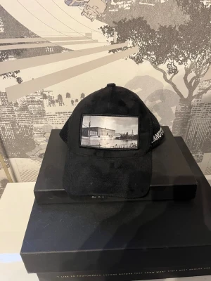 Pianotti keps - Säljer min pianotti keps som ej går och få tag på längre, knappt använd så är som ny!