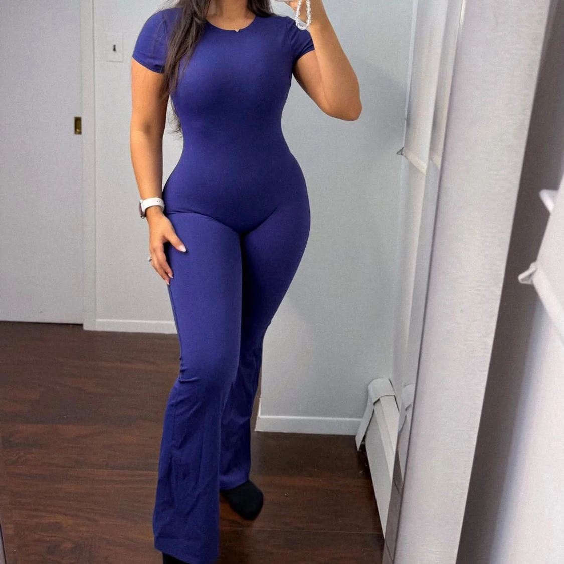 Blå tight byxdress med utsvängda ben