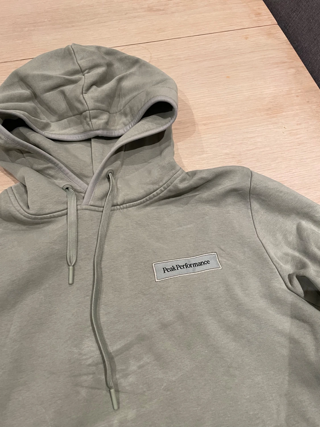 Ljusgrön hoodie Peak Performance S - 1