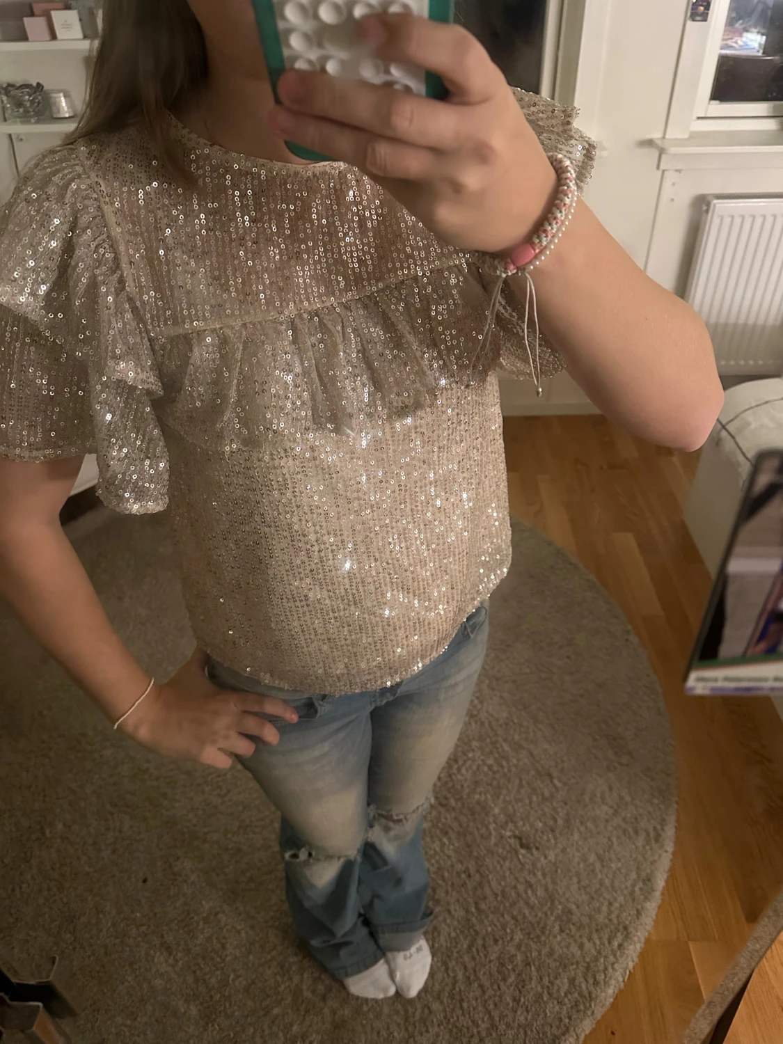 Glittrig volangblus från Lindex