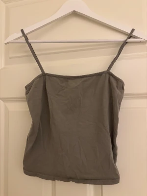 Grön/grå linne från H&M - Säljer en grön/grå färg linne från H&M i storlek S