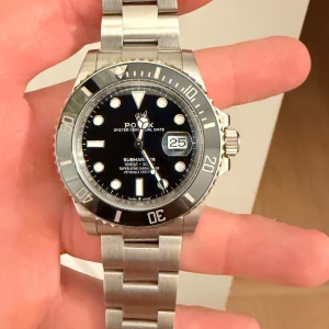 Submariner rolle - Hej! Skriv till mig kring frågor! Nypriset på denna är ca 8-9k! Låda och kort finns till. Kan ej skriva mer då Plick tar bort annonsen