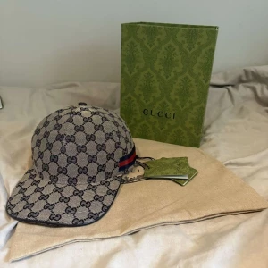 GG keps - Helt ny GG keps storlek M, dustbag och tags medföljer 