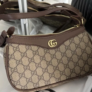 Väska brun - Brun väska oanvänd 