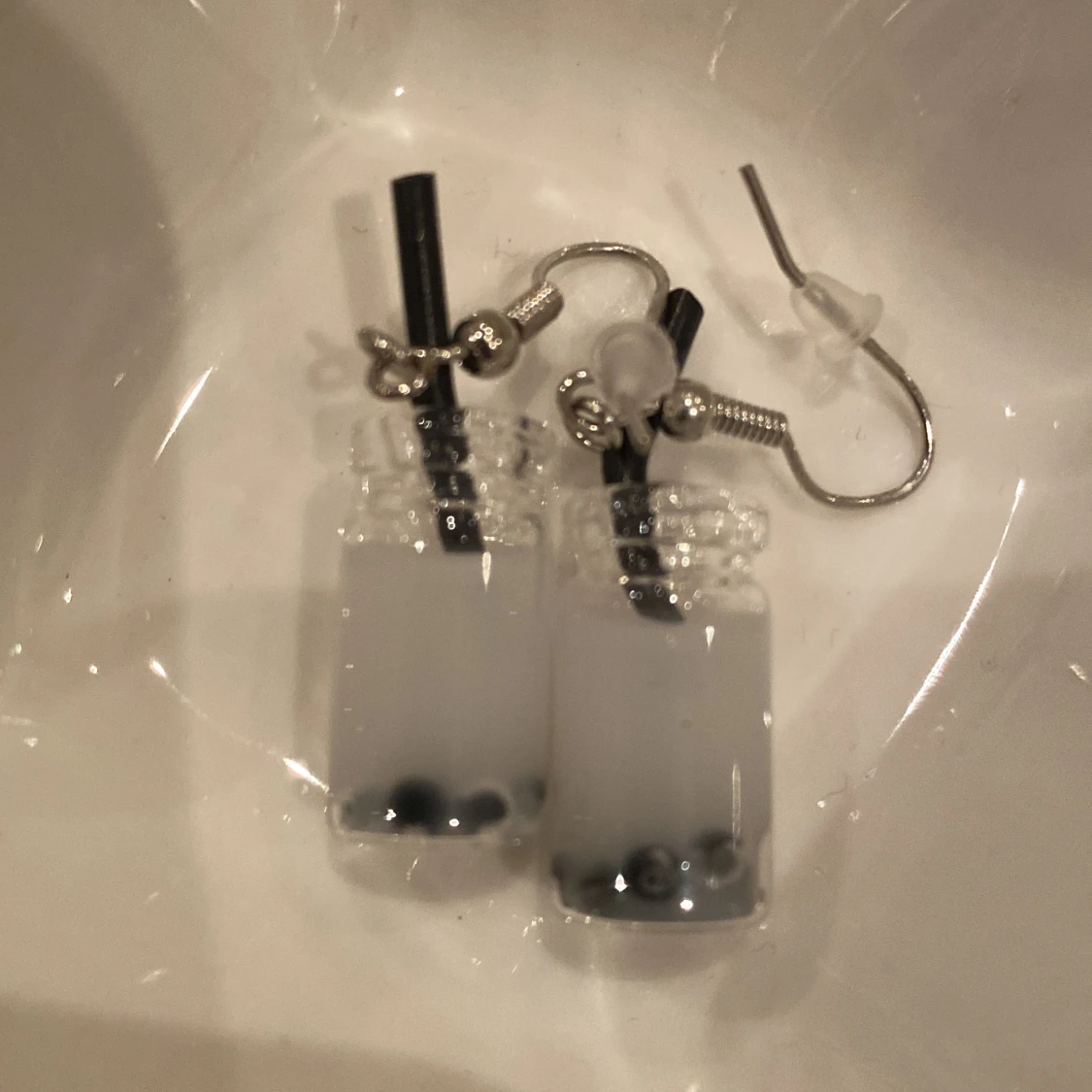 Örhängen med matchande lyckoängel