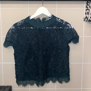 Spetsblus - Fint mörkgrön spelstopp 