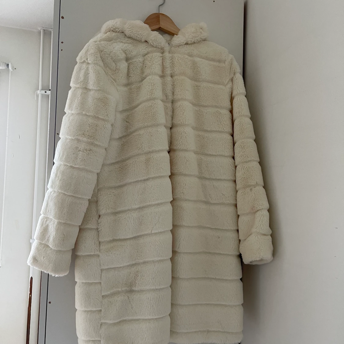 Vit pälsjacka 