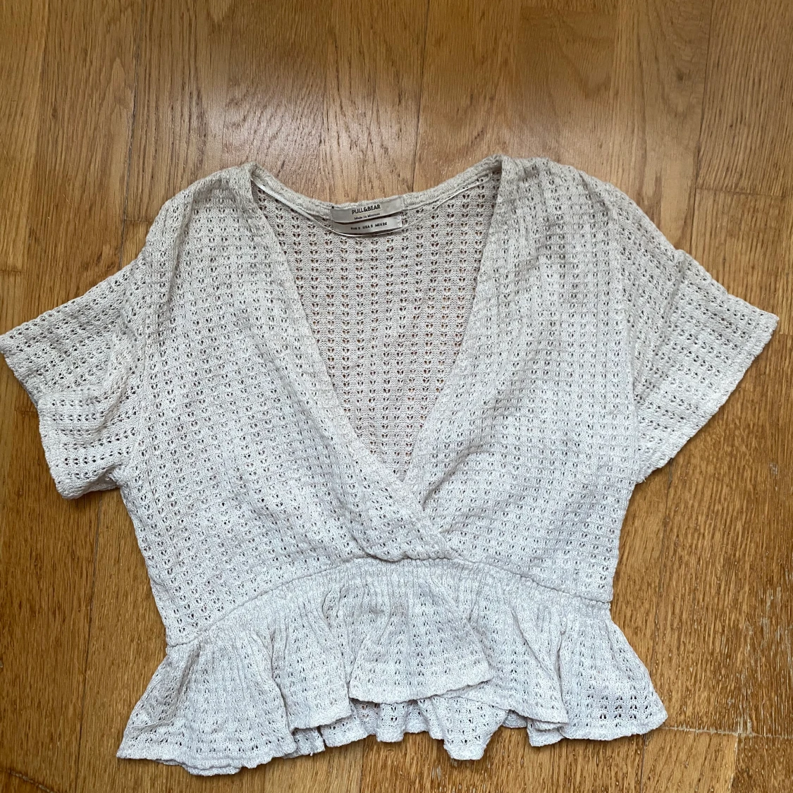 Croppad stickad topp från Pull&Bear