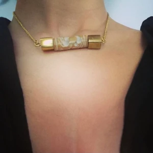 Necklace (chocker) - It’s a hand made costume Afghanistan’s precious stone necklace made of sliver chain and a historical winged horse pices which mostly believed the winged horse is the symbol of luck and power. 