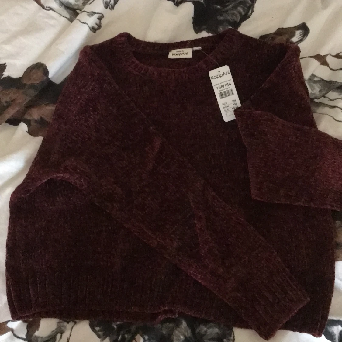 En tröja från Kappahl lila stl 158/164 - 90