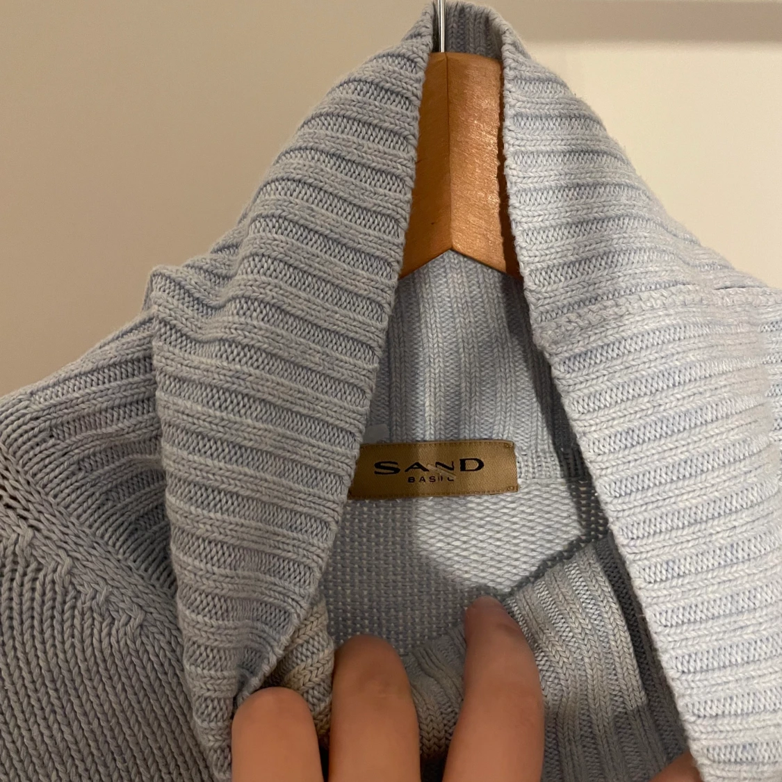 Stickad ljusblå polo  - 91