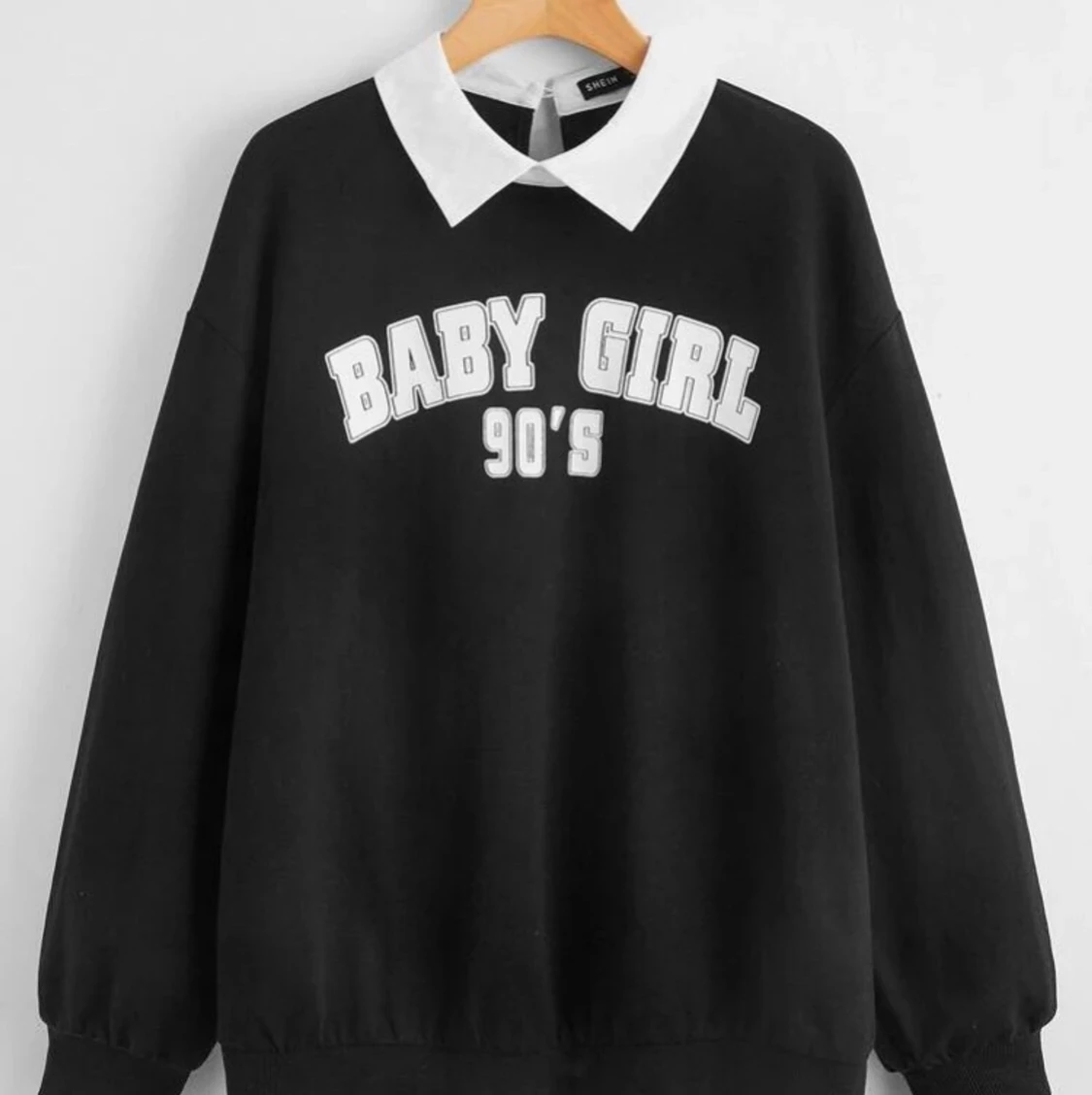 Snygg svart sweatshirt.