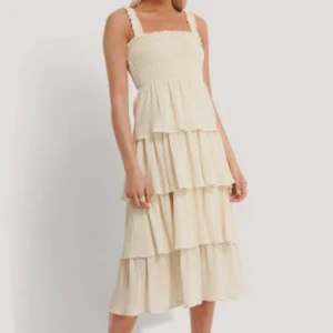 Klänning - Klänning från NAKD x AFJ. Använd 1 gång