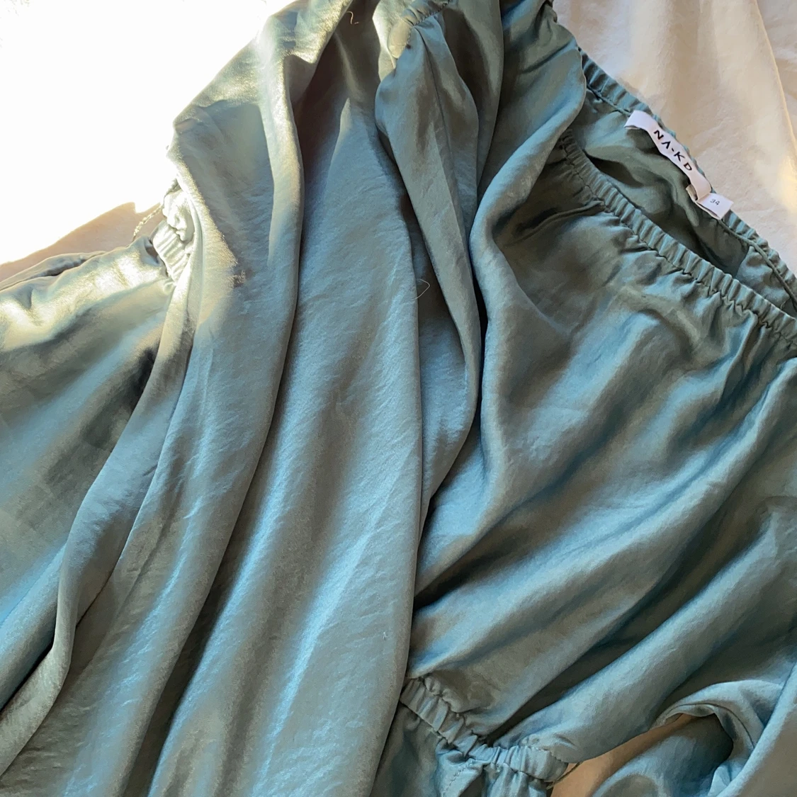 Off-shoulderklänning från NA-KD - stl 34 - 90