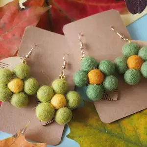 Lovely three different color wool felt stack earring. Very cute and will bring up your day :), specially during autumn.    The earring are handmade by me with love. The earrings are made from wool. I sew it together to make it last long. 