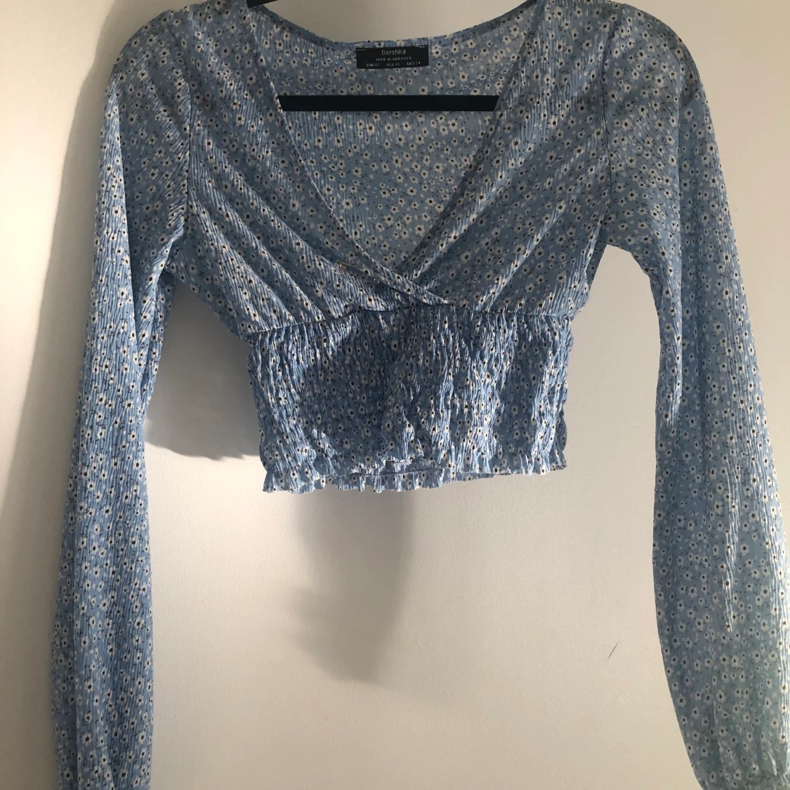 En söt top från bershka storlek XS