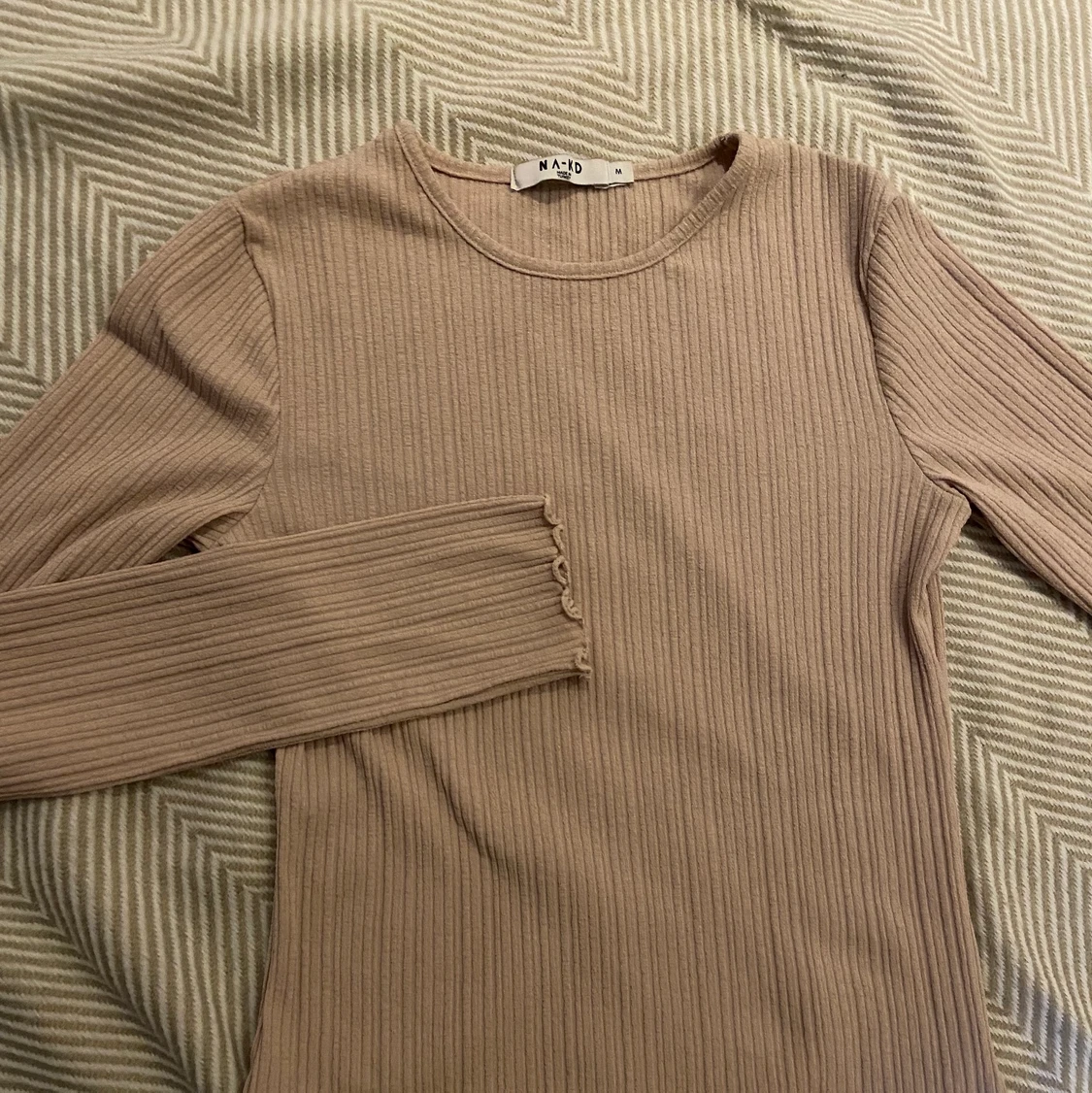 Beige ribbad långärmad