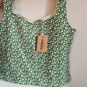 Topp - Oanvänd mönstrad topp i bomull. Stl. M