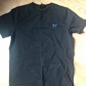 Svart t-shirt, st M - Svart t-shirt i storlek M aldrig använd 