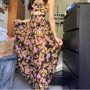 ASOS long dress  - Worn once, no faults. Long black dress, with rose and gold details. Bought for 30 £.