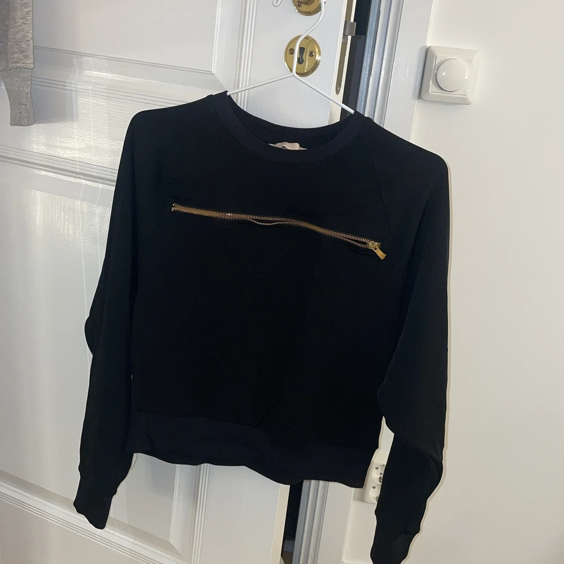 Tröja med dragkedja