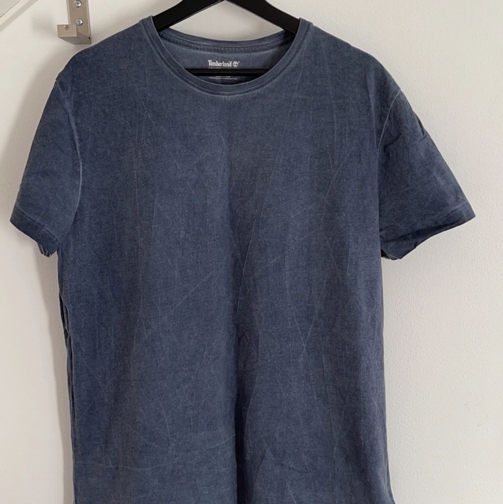 Timberland T-shirt, washed out blå färg. Storlek L. T-shirts.